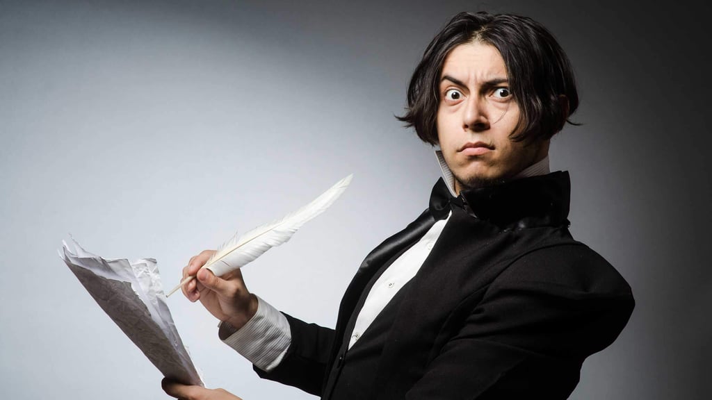 Man using quill and paper to create marketing plan